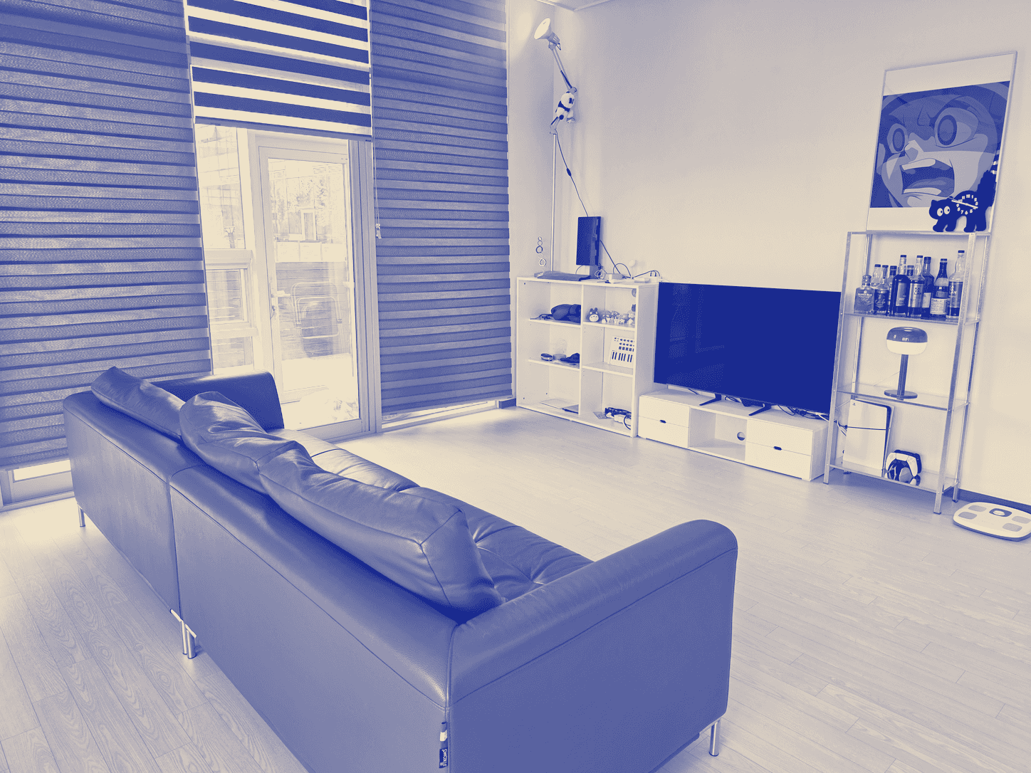 Inside the Asan workshop — a room with a window and a sofa